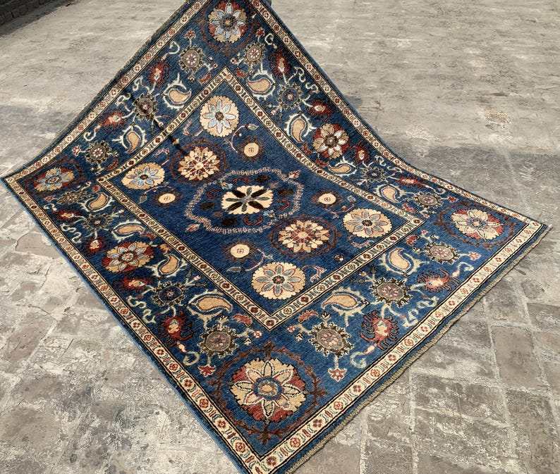 Vintage Oushak Hand Knotted Wool Rug in deep navy blue featuring large floral medallions and intricate botanical patterns with cream and red accents