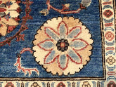 Vintage Oushak Hand Knotted Wool Rug with deep navy field, large cream floral medallions, red and blue accents, and intricate border patterns