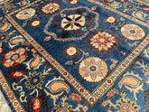 Vintage Oushak Hand Knotted Wool Rug with deep navy field, large floral medallions, intricate cream and terracotta border, and botanical motifs